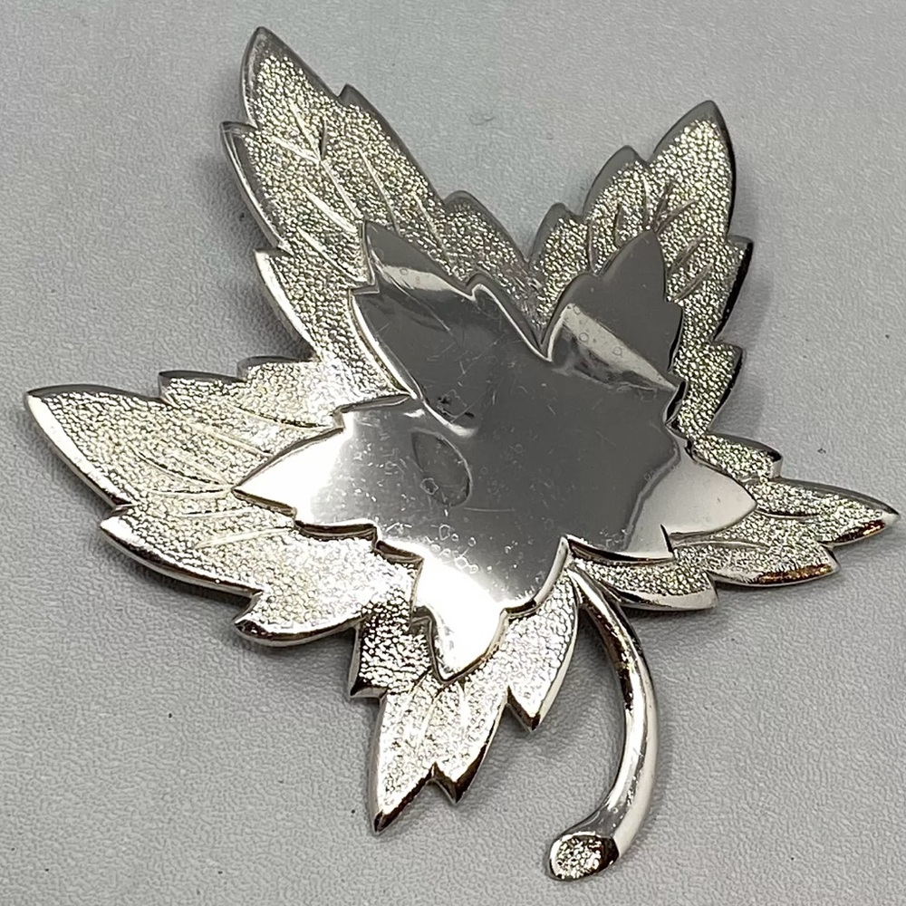 Vintage Monet silver plated, maple leaf brooch